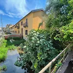 Green Oasis On Water In The Center Of Milan